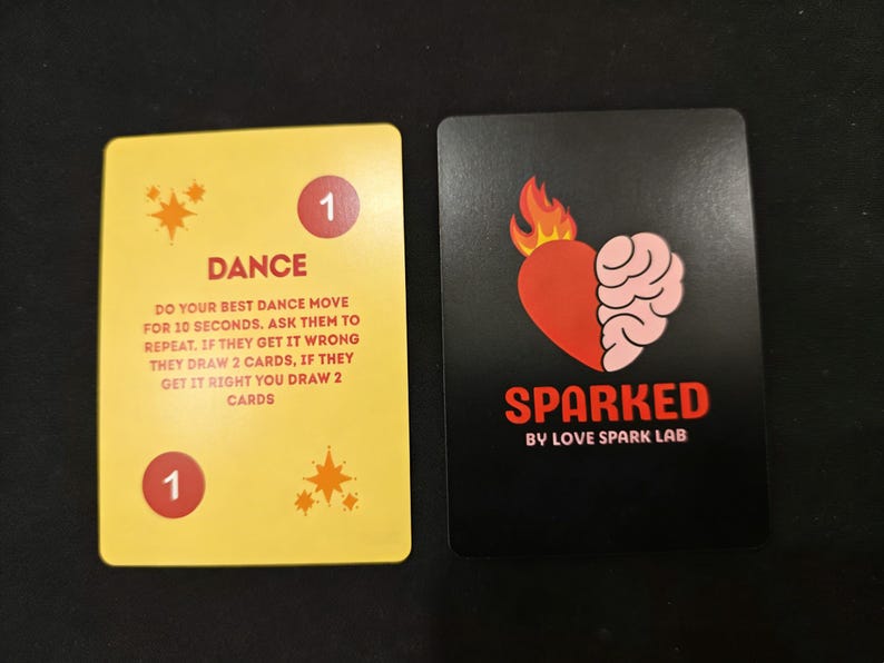 SPARKED card with prompt visible — couples conversation starter